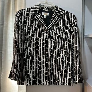 Talbots blazer size 10. Exterior is 100 percent silk, lining is polyester.